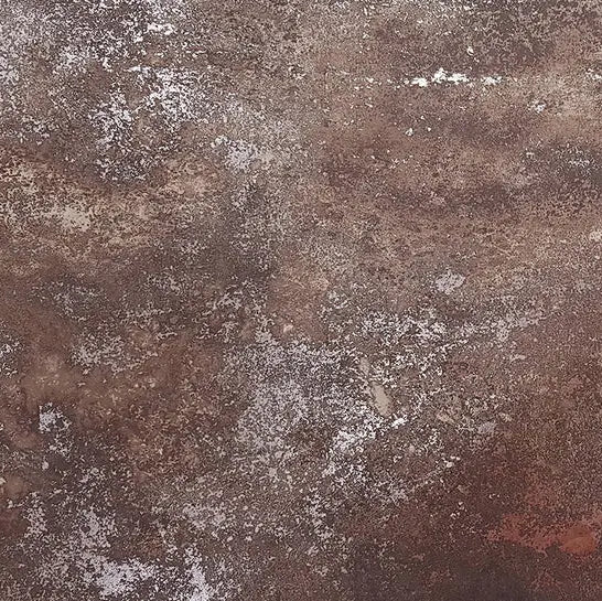 A full-frame textured surface with a distressed, weathered finish in mottled brown, gray, and off-white tones.